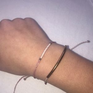2 pretty and pink Pura Vida bracelets